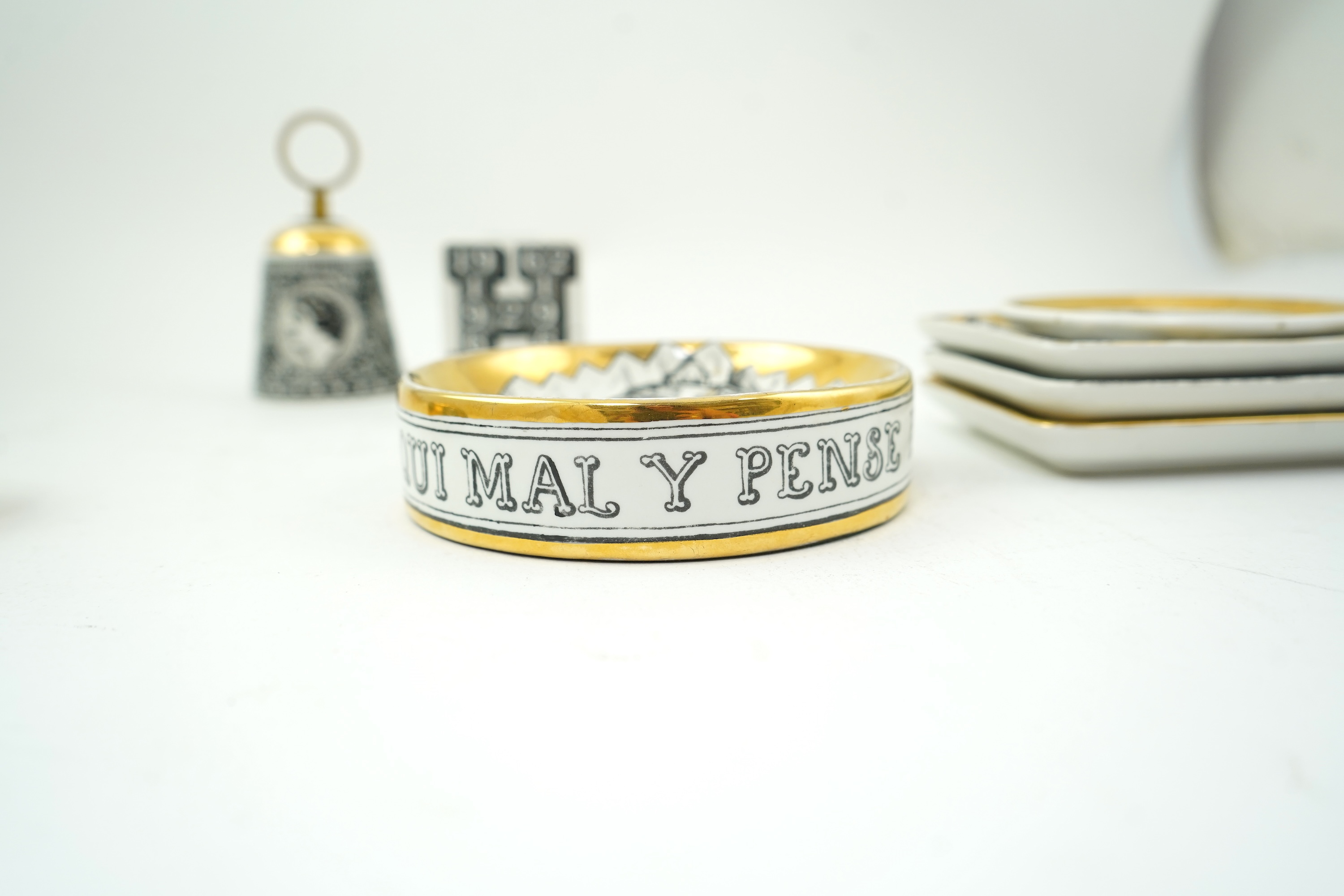 Piero Fornasetti (Italian, 1913-1988): A collection of Fornasetti desk items and dishes